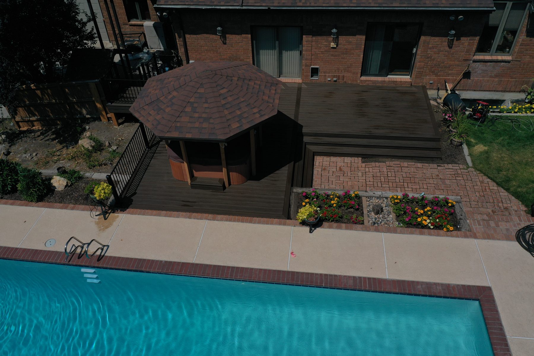Poolside deck with composite decking