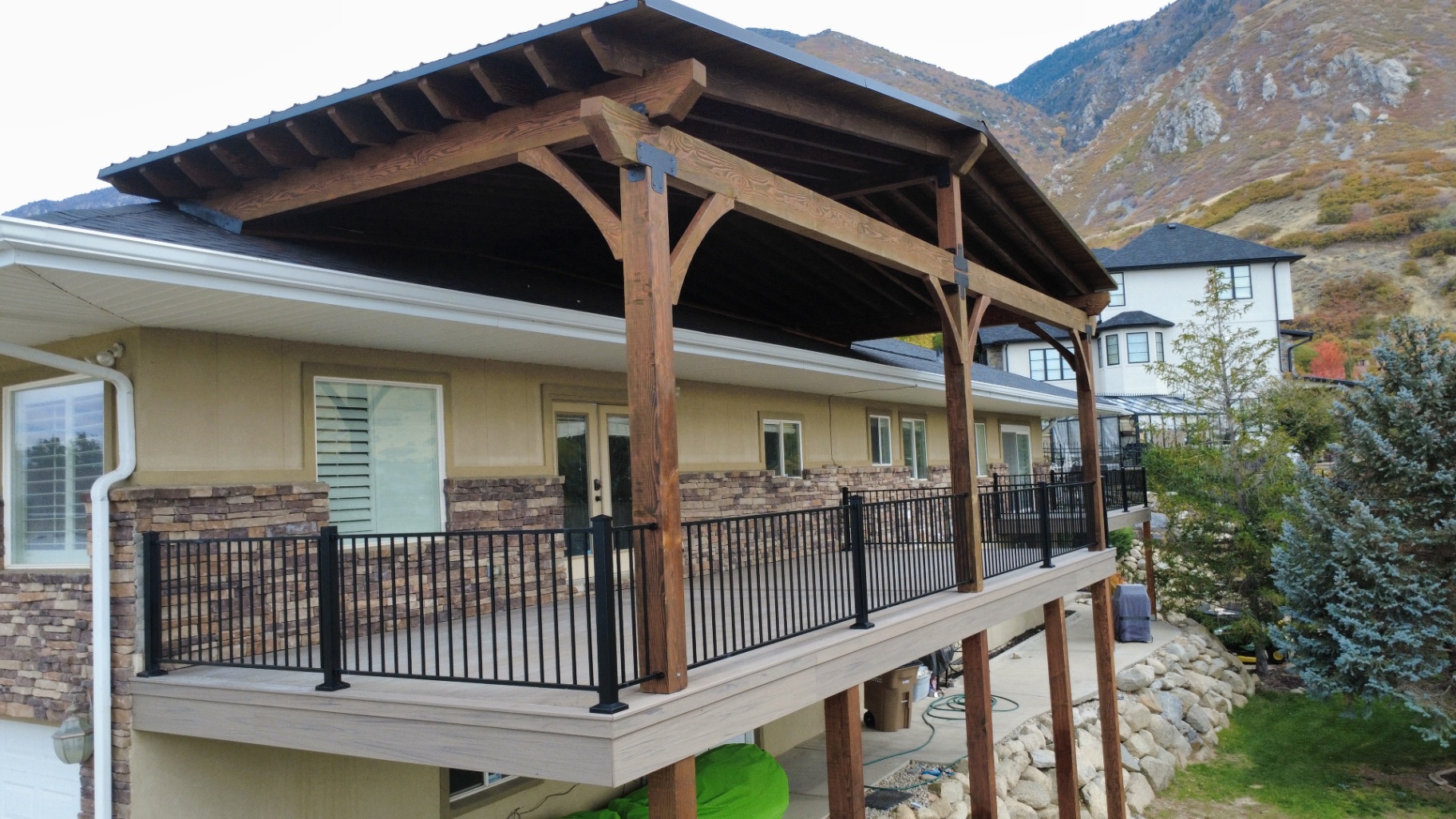 Mountain pavilion and deck with gabled timber roof
