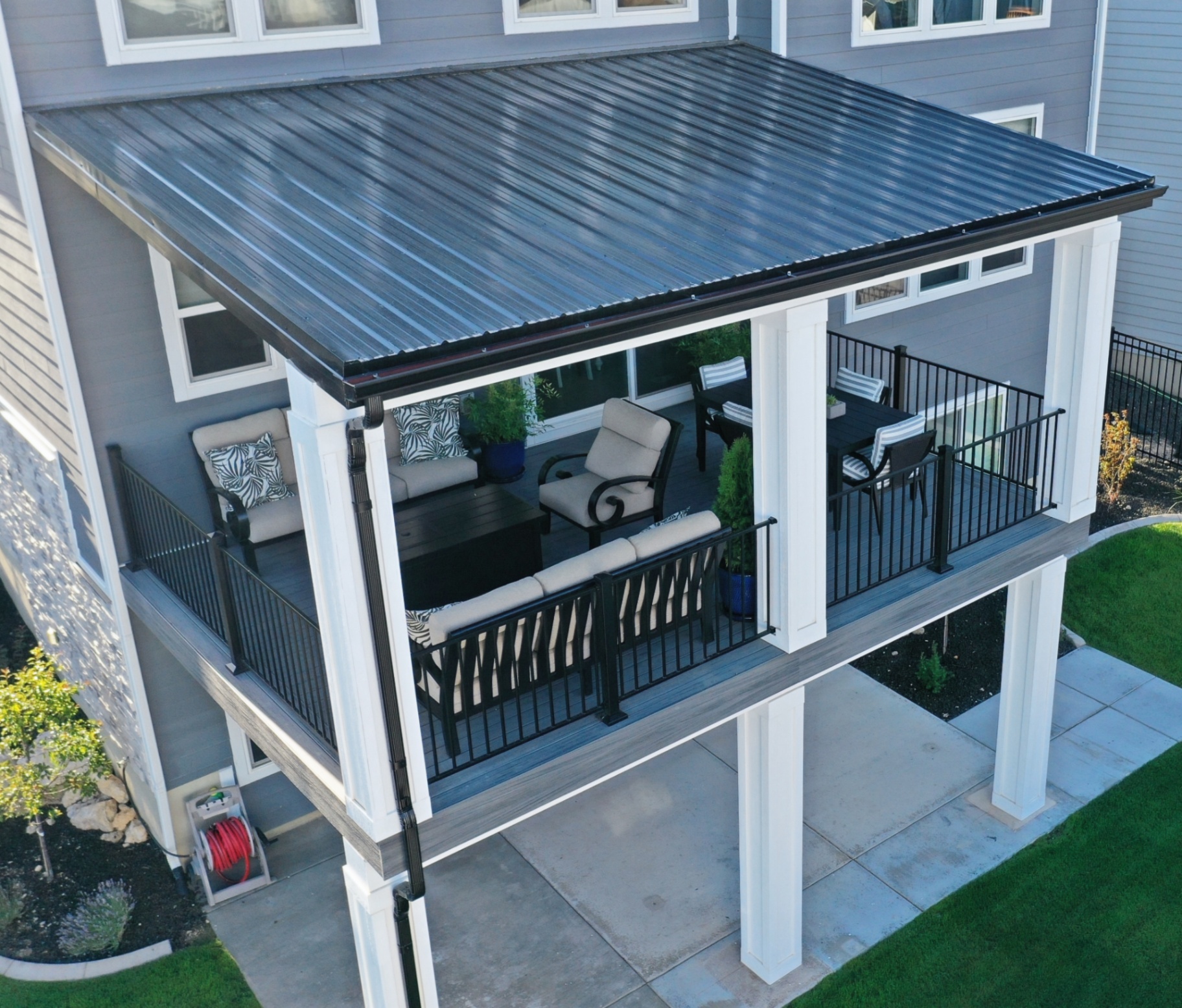 Covered deck outdoor living room, aerial view