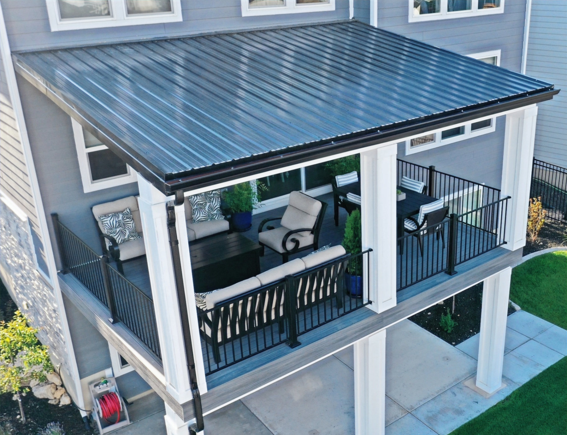 Covered composite deck with metal roof, aerial view